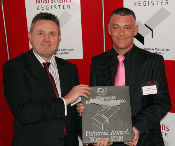 Kerry from Jacksons Landscape Designs receiving a national award for garden design and landscaping work.