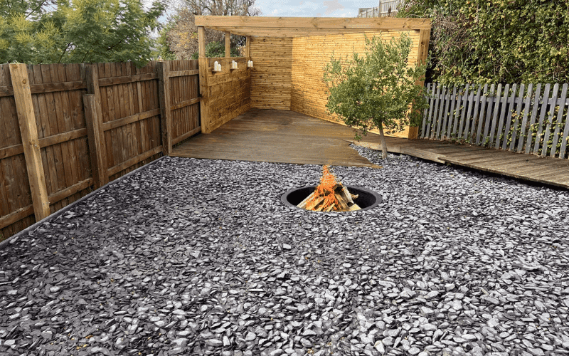 a fire pit to create a visual anchor and relaxing atmosphere.