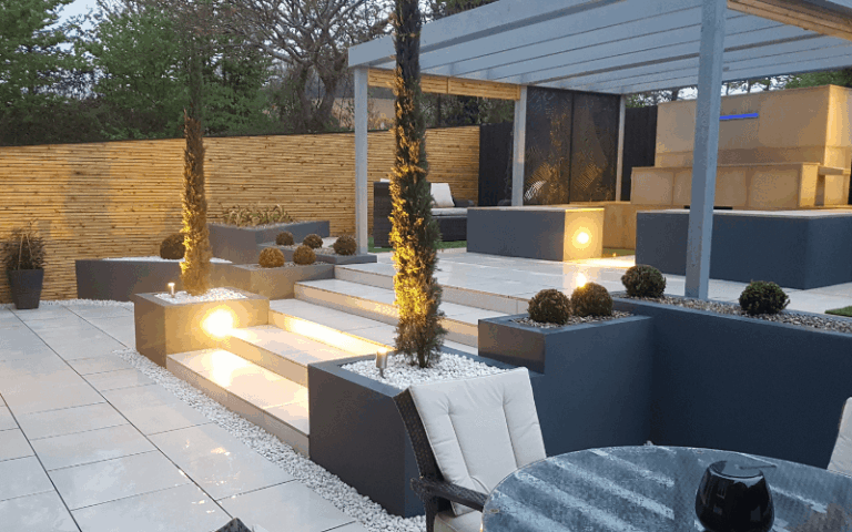 Garden paving on two levels with steps and lighting