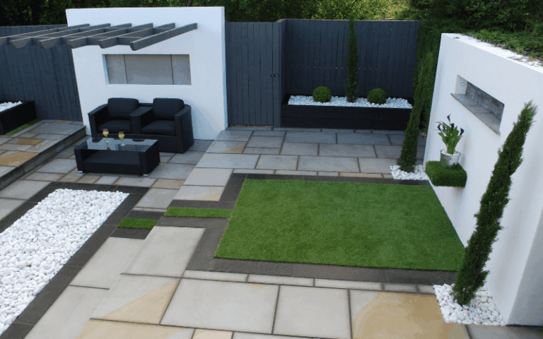 A small patch of artificial grass which enhances the garden design